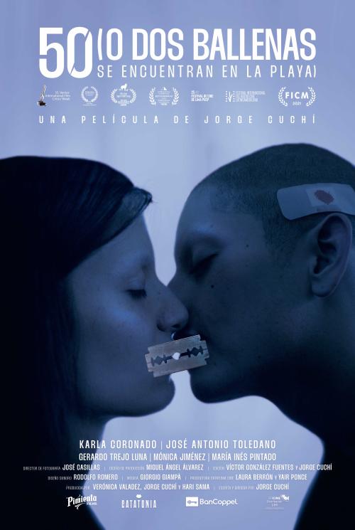 50 (o Dos ballenas se encuentran en la playa)